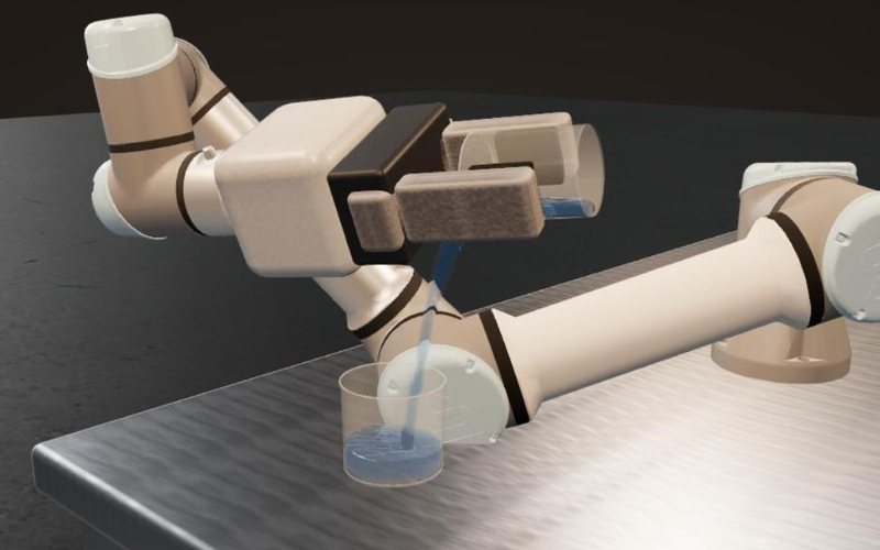 Simulator render: a collaborative arm tips a beaker over its lip and a thin stream of water falls into a cup on the table.